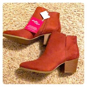 Beautiful burnt red booties. Never worn.